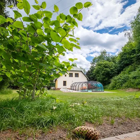 With A Covered Pool, Park, And Playground *