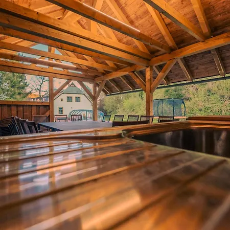 With A Covered Pool, Park, And Playground *